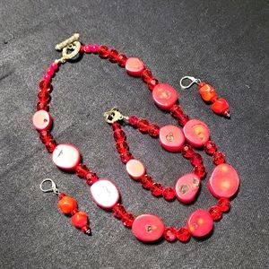 Beautiful, rich, burgundy jewelry set.